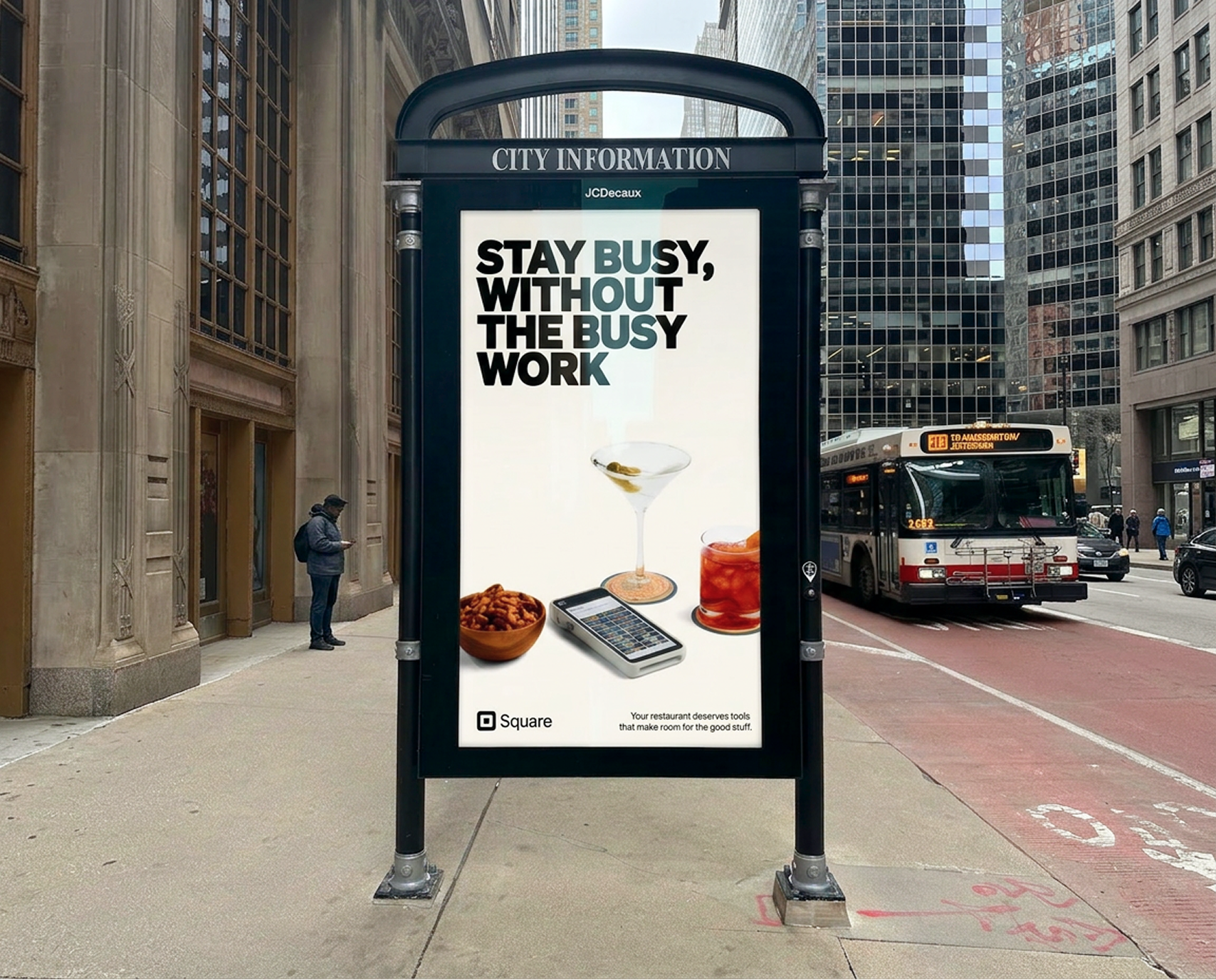 JCDecaux street kiosk with Square F&B OOH — Stay busy without the busy work; Terminal, drinks, and snacks on city sidewalk